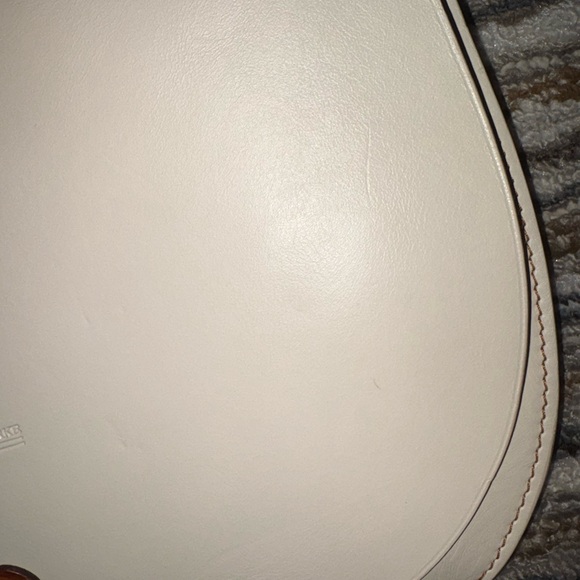 Dooney And Bourke Alto Cream Leather Saddle Crossbody Bag